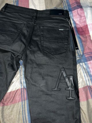 Amiri Jeans Neri con Logo
