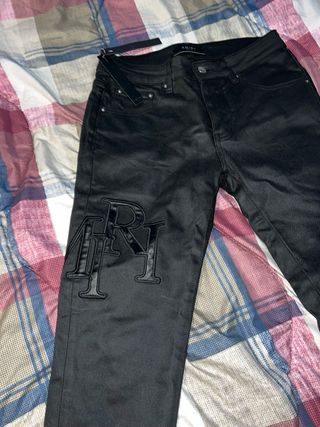 Amiri Jeans Neri con Logo