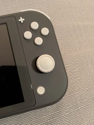 Nintendo Switch Lite Nera (scatola originale) + custodia