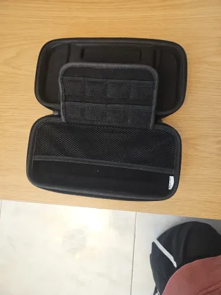 Nintendo Switch OLED + Custodia + Controller Pro