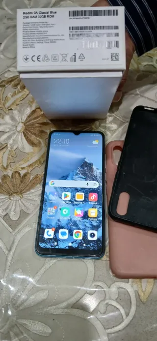 Redmi 9A multicolor, con  caricabatterie e  2 cov