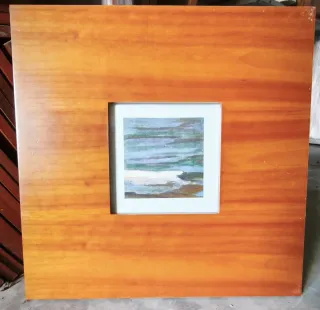 Marcos de madera con láminas de paisajes