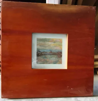 Marcos de madera con láminas de paisajes