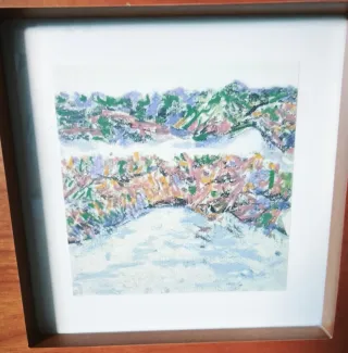 Marcos de madera con láminas de paisajes