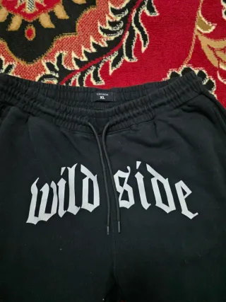 Tuta uomo nera con scritte