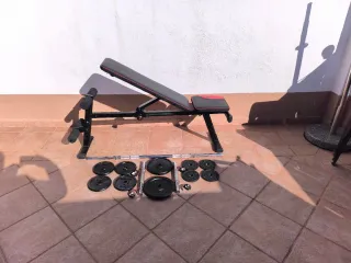 Banco de pesas, barra y discos