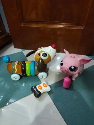 Perro teledirigido y cerdito