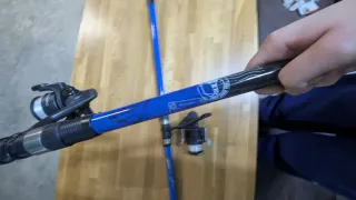 Caña de pescar con carrete y flotador