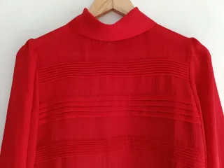 Blusa roja El Corte Inglés semitransparente