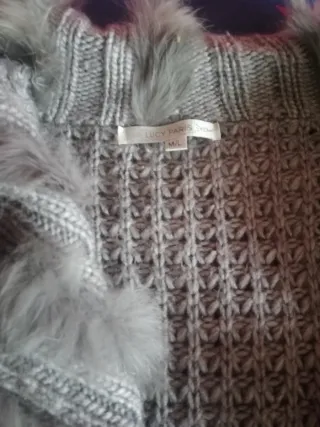 Chaqueta de punto con cinturón y pelo