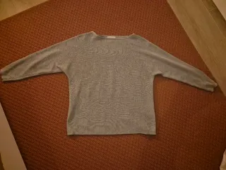 Jersey gris de manga larga