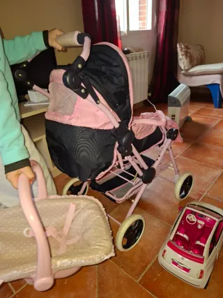 Carrito, cuco y coche de muñeca rosa