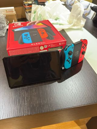 Nintendo Switch OLED Blu e Rosso impeccabile