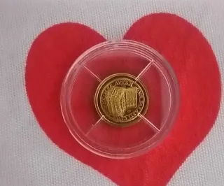 Moneta d'oro con certificato