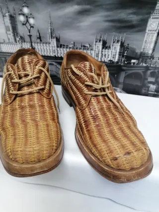 Zapatos de piel trenzada