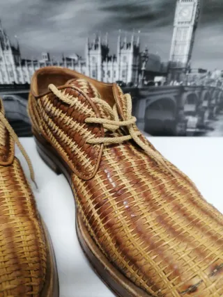 Zapatos de piel trenzada