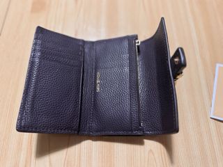 Cartera Michael Kors Marrón chocolate.