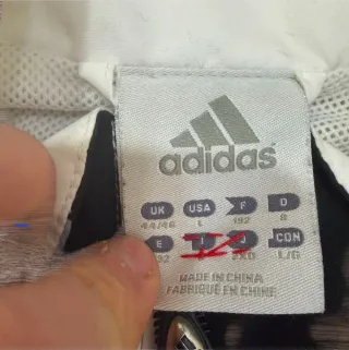 Giacca a vento Adidas uomo