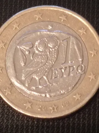 Lote 2 monedas búho 2002