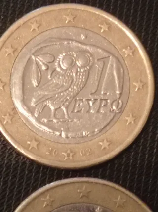 Lote 2 monedas búho 2002