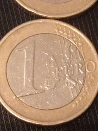 Lote 2 monedas búho 2002