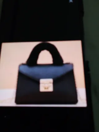 Borsa donna con manico in pelliccia