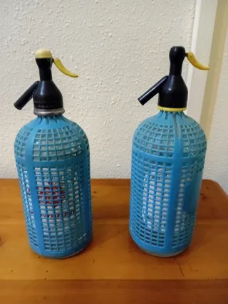 2 Sifones de vidrio con rejilla azul