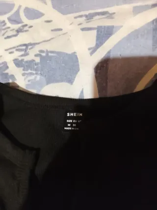 Chaleco SheIn negro cadenas cruzadas M