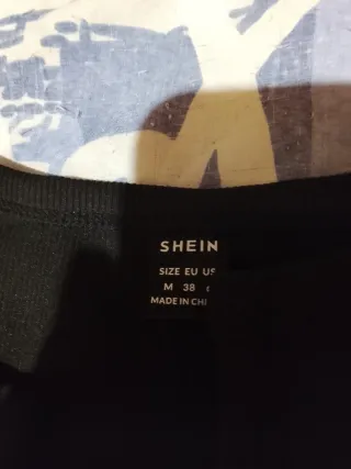 Chaleco SheIn negro cadenas cruzadas M