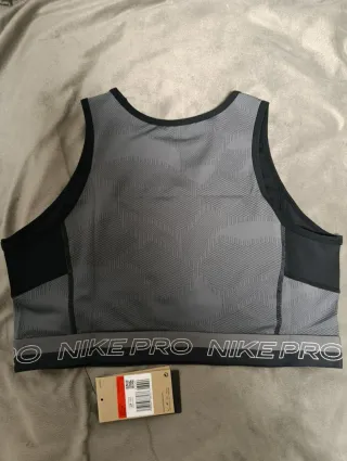 Top deportivo Nike Pro mujer gris