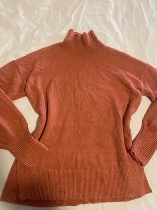 Suéter rosa cuello alto