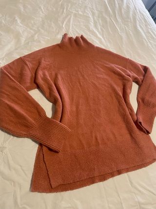 Suéter rosa cuello alto