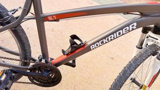 Bicicleta Rockrider Gris y Naranja