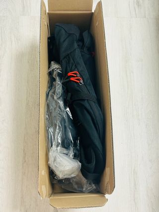 Mochila negra + afeitadora Philips