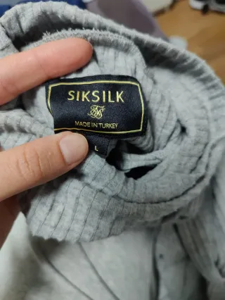 Jersey SikSilk Cuello Alto nuevo L