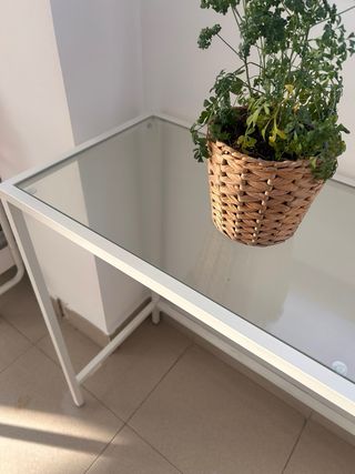 Consola de cristal y metal