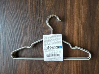 Perchas infantiles gris claro