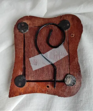 Piccola cornice in legno intagliato