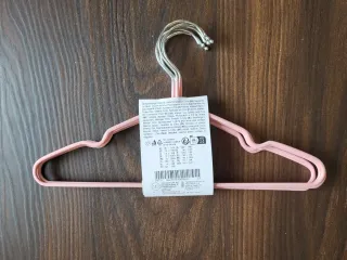 Perchas infantiles rosas