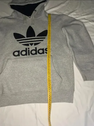 Gray sweatshirt with adidas on the chest