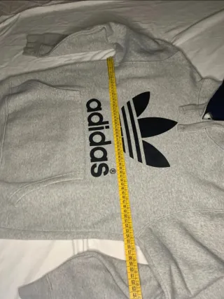 Gray sweatshirt with adidas on the chest