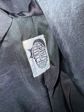 Cappotto in pelliccia nera con inserti