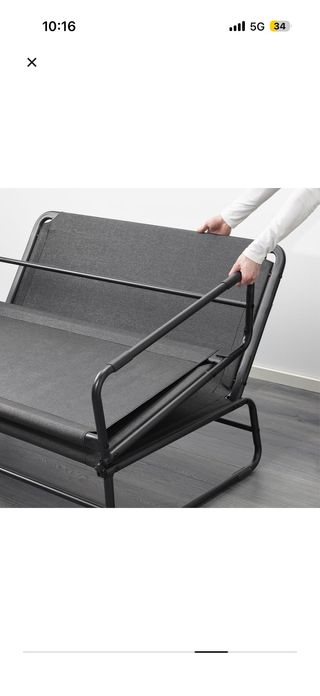 Sofá cama gris tela y metal