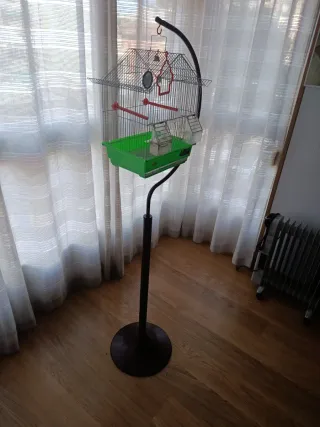 Jaula para pájaros con brazo colgador