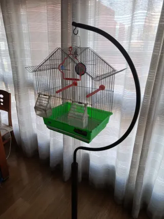 Jaula para pájaros con brazo colgador