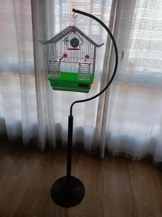 Jaula para pájaros con brazo colgador
