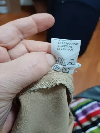 Pantaloni beige gamba ampia