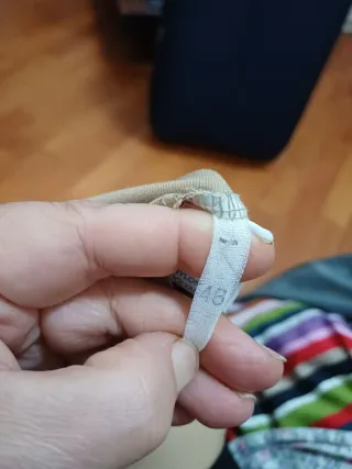 Pantaloni beige gamba ampia