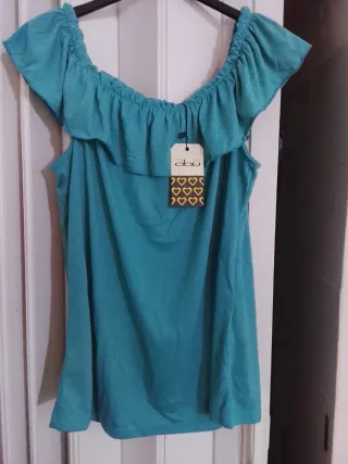 Blusa OBU volante azul celeste