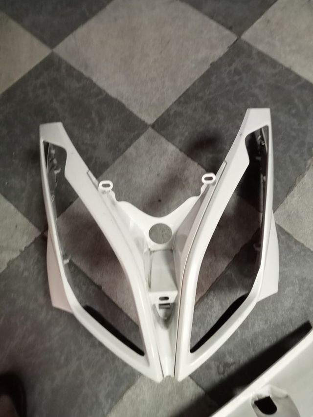 Frontal y Cacha Kymco Super Dink 125 (2011)